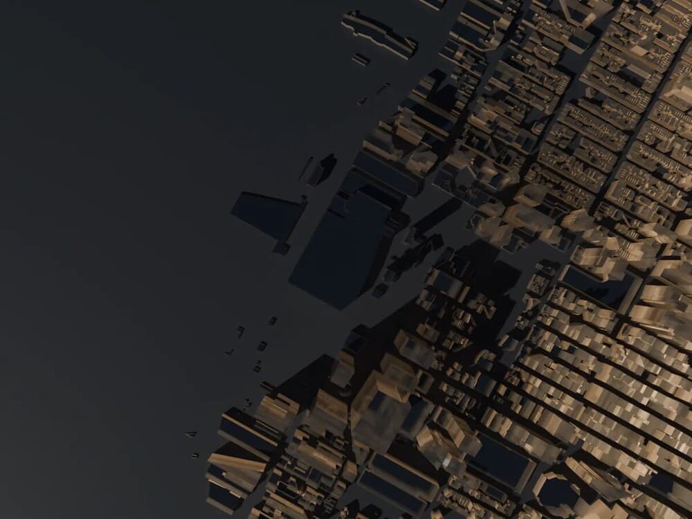 A pre-rendered descent plate: straight down over a lit city grid against dark water